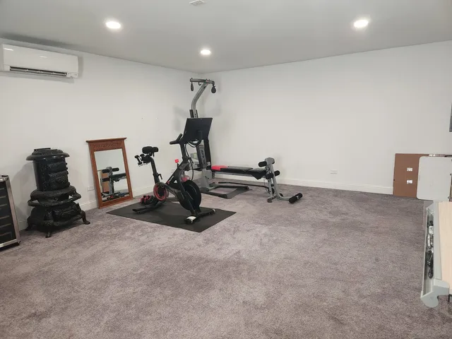 a view of a house with a yard porch and sitting area