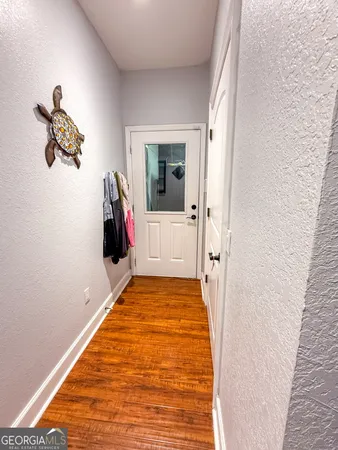 a view of a golf course with a lake