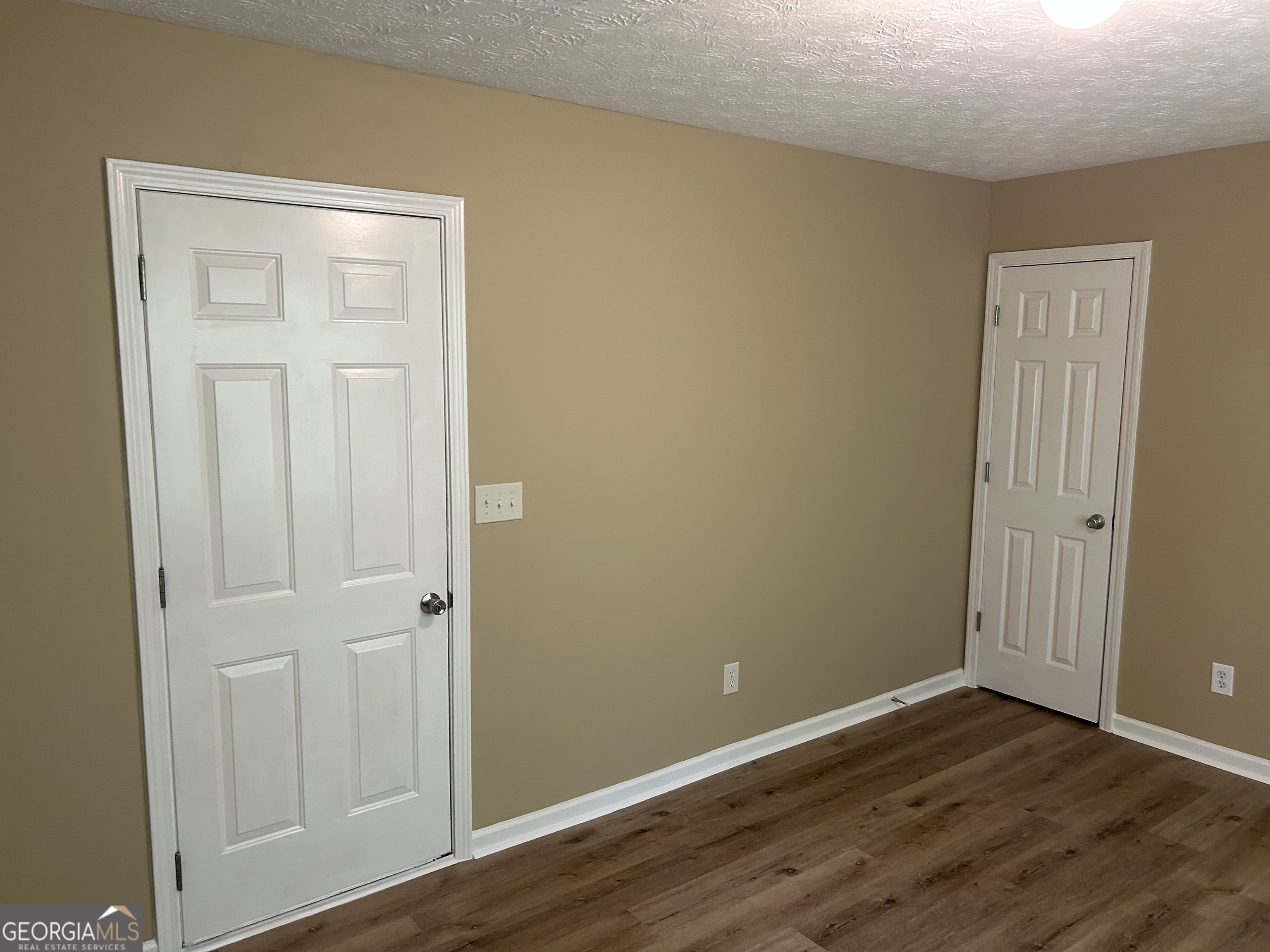 134 Cemetary Road Luthersville, GA 30251 - Photo 17 of 22 a view of empty room with wooden floor