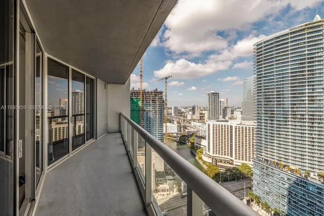 a view of a balcony with a bench