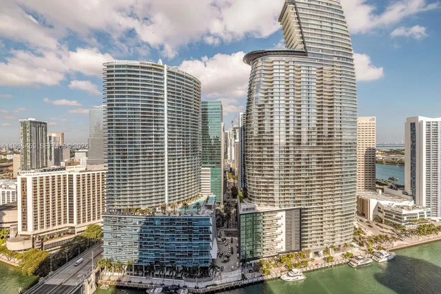 a view of a wooden deck with a table and chairs