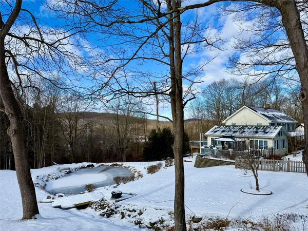 a outdoor space with lots of white furniture
