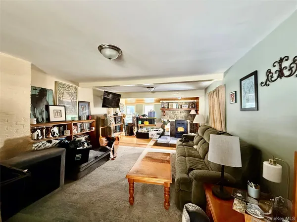 a view of a livingroom with furniture and a living room