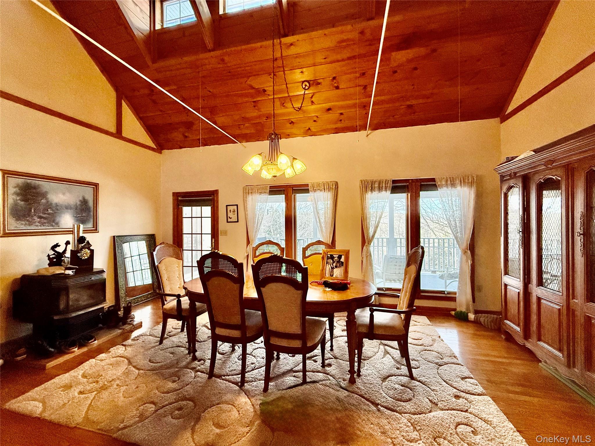 912-918 Hollow Road Salt Point, NY 12578 - Photo 8 of 29 a view of a dining room with furniture and chandelier