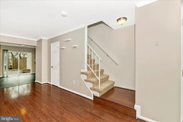 a view of entryway with wooden floor
