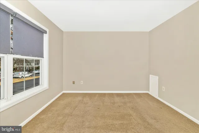 an empty room with a window