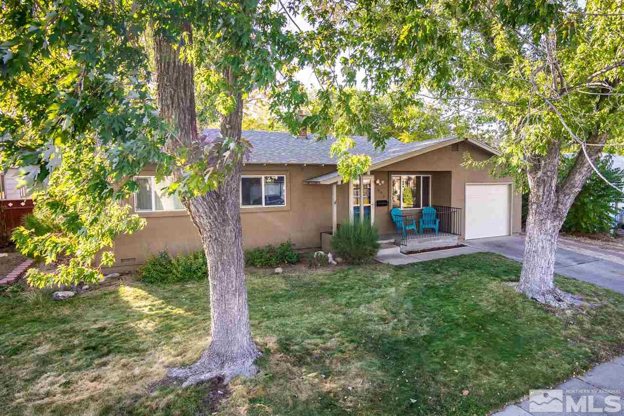 495 Ballentyne Way Reno, NV 89502 - Photo 1 of 25 a front view of a house with garden
