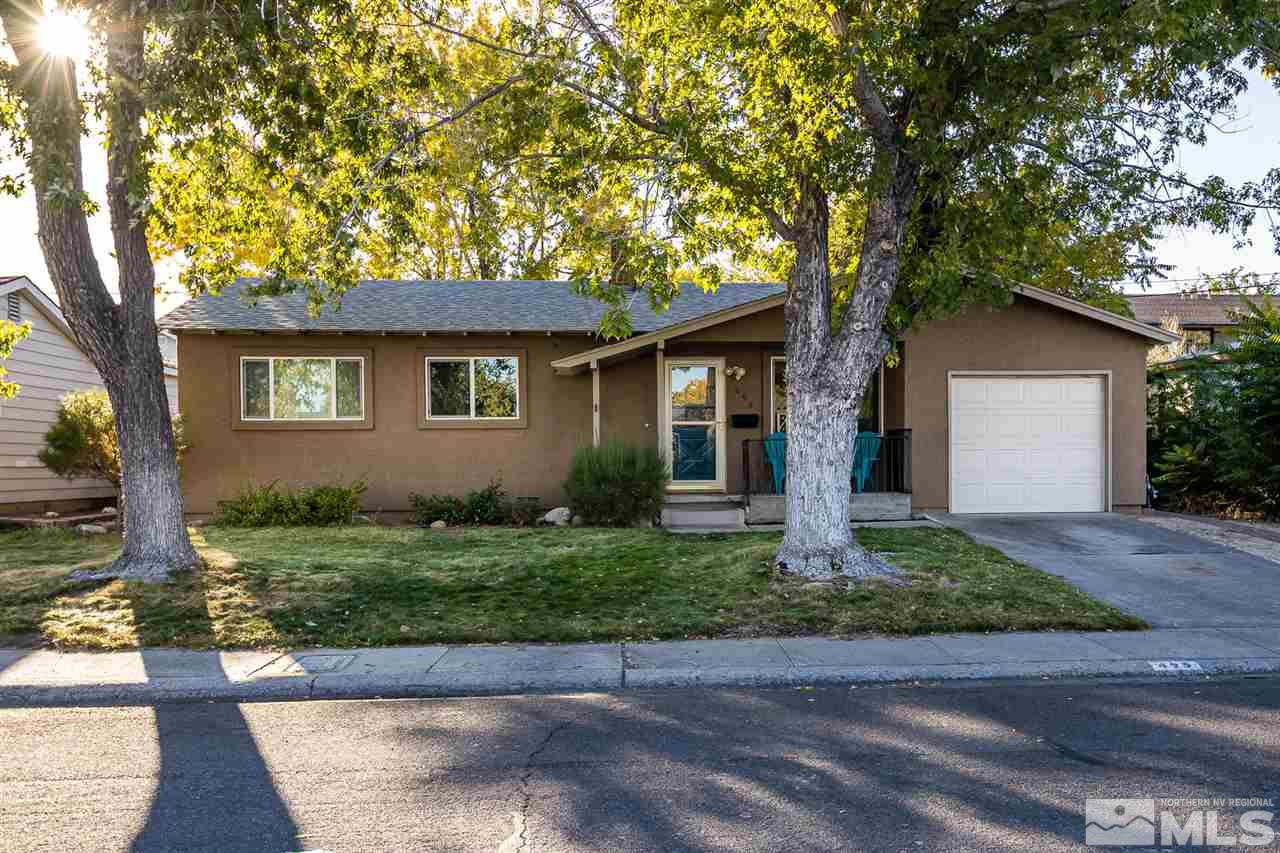 495 Ballentyne Way Reno, NV 89502 - Photo 2 of 25 a front view of a house with a yard and tree s
