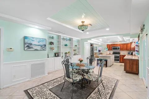 a view of a dining room with furniture