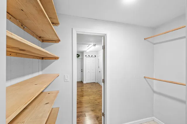 a bathroom with a shower and a sink