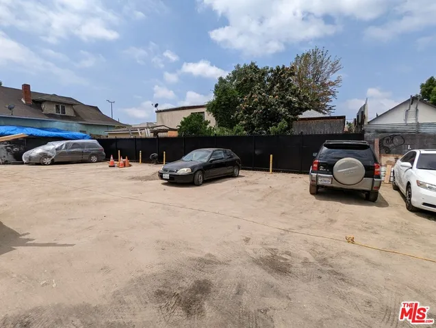 a view of cars parked in a parking lot