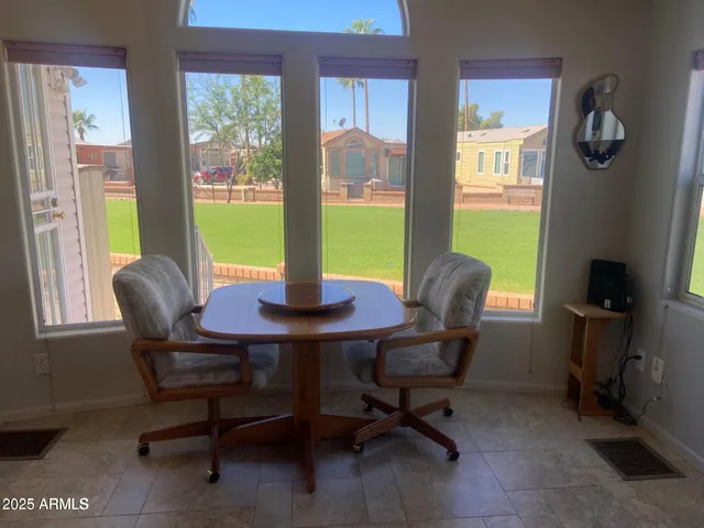 a kitchen with refrigerator cabinets and stainless steel appliances