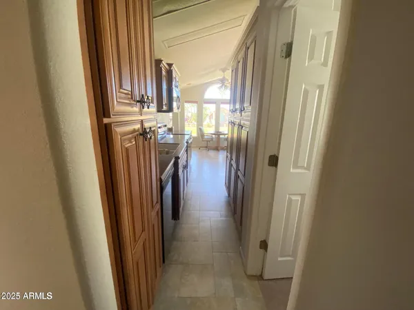 a bathroom with a granite countertop toilet sink and shower