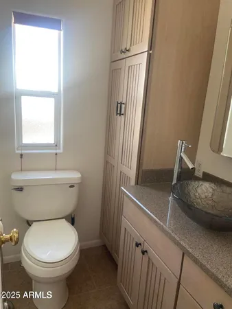 a bedroom with a bed and furniture