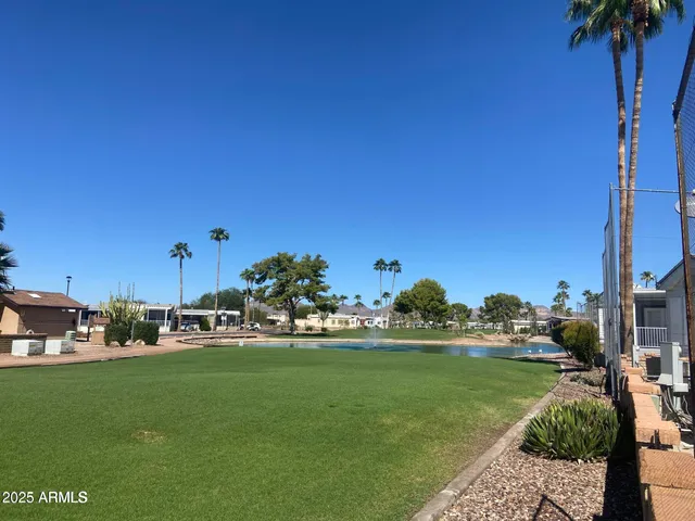 a view of house with a garden