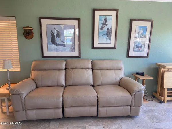 a living room with furniture and a couch