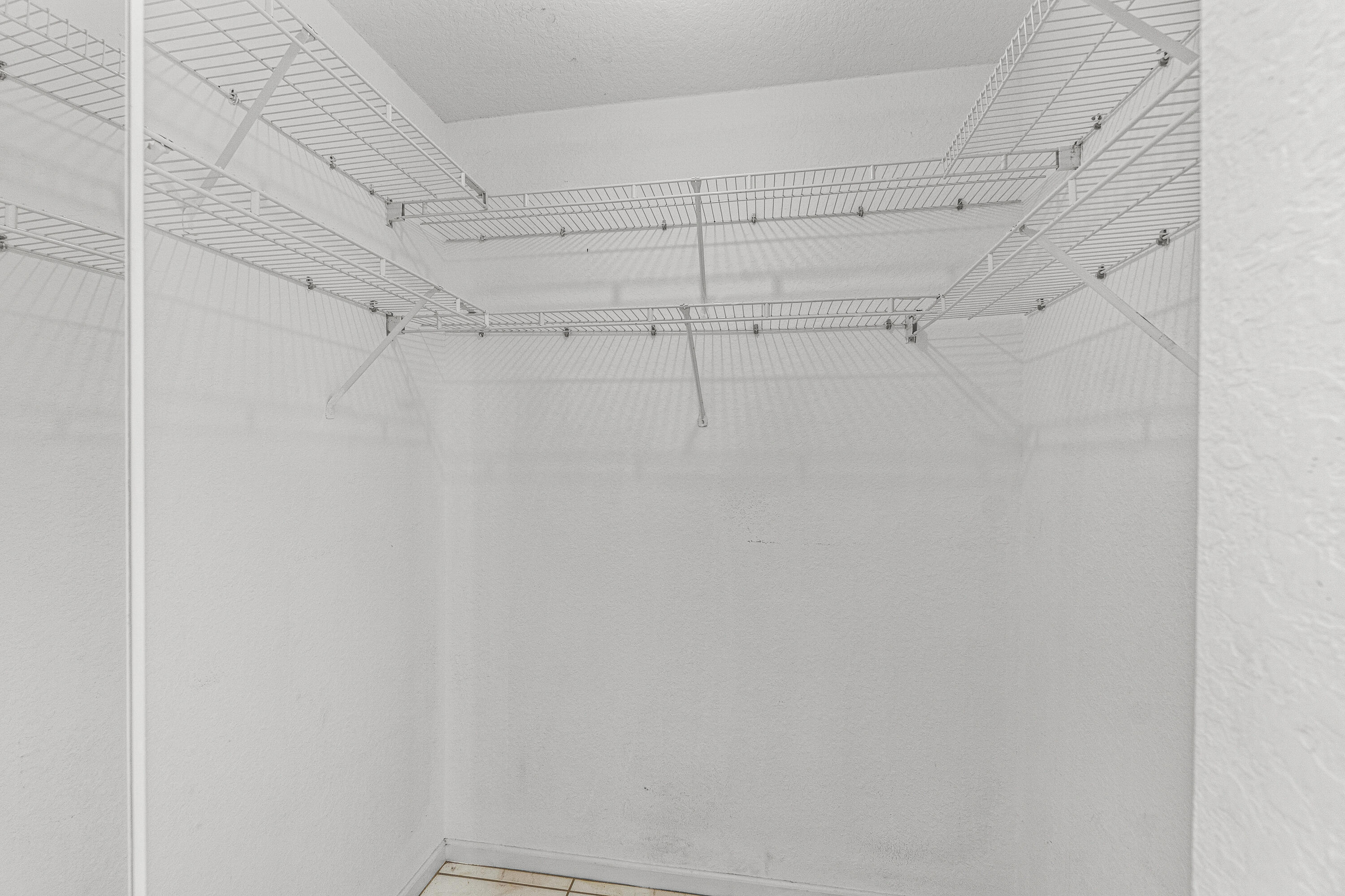 4263 Northwest 29th Way Boca Raton, FL 33434 - Photo 12 of 21 Walk-in Closet in Primary Suite #2