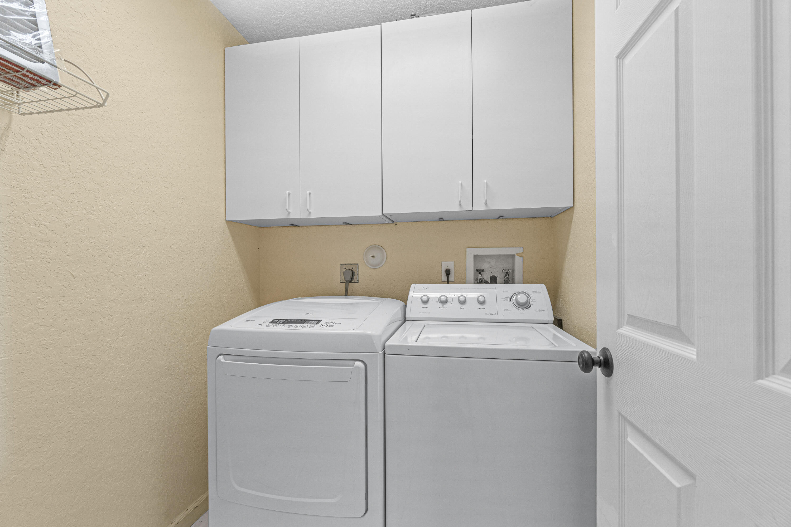 4263 Northwest 29th Way Boca Raton, FL 33434 - Photo 16 of 21 Laundry Room