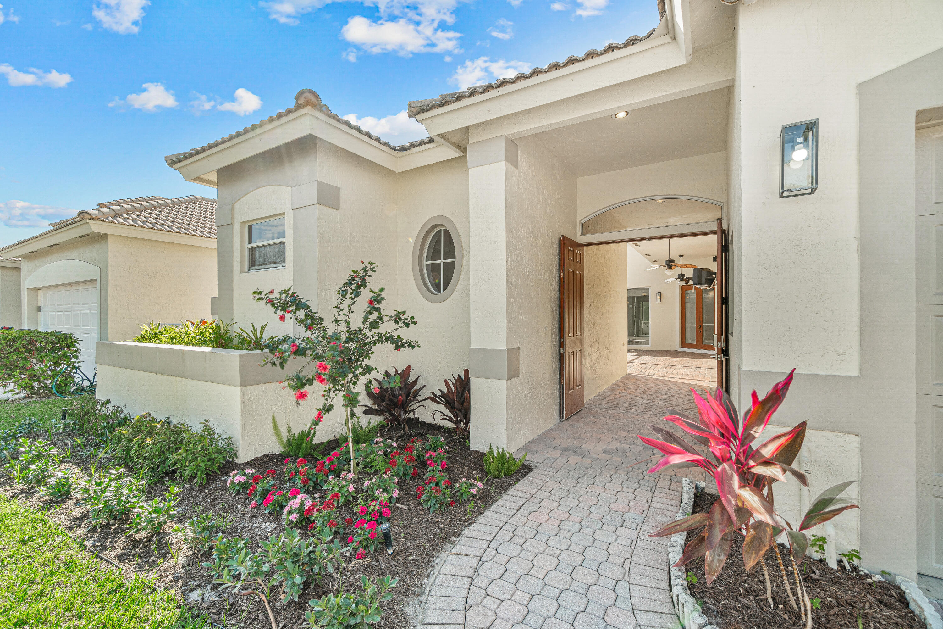 4263 Northwest 29th Way Boca Raton, FL 33434 - Photo 2 of 21 Entry to Courtyard