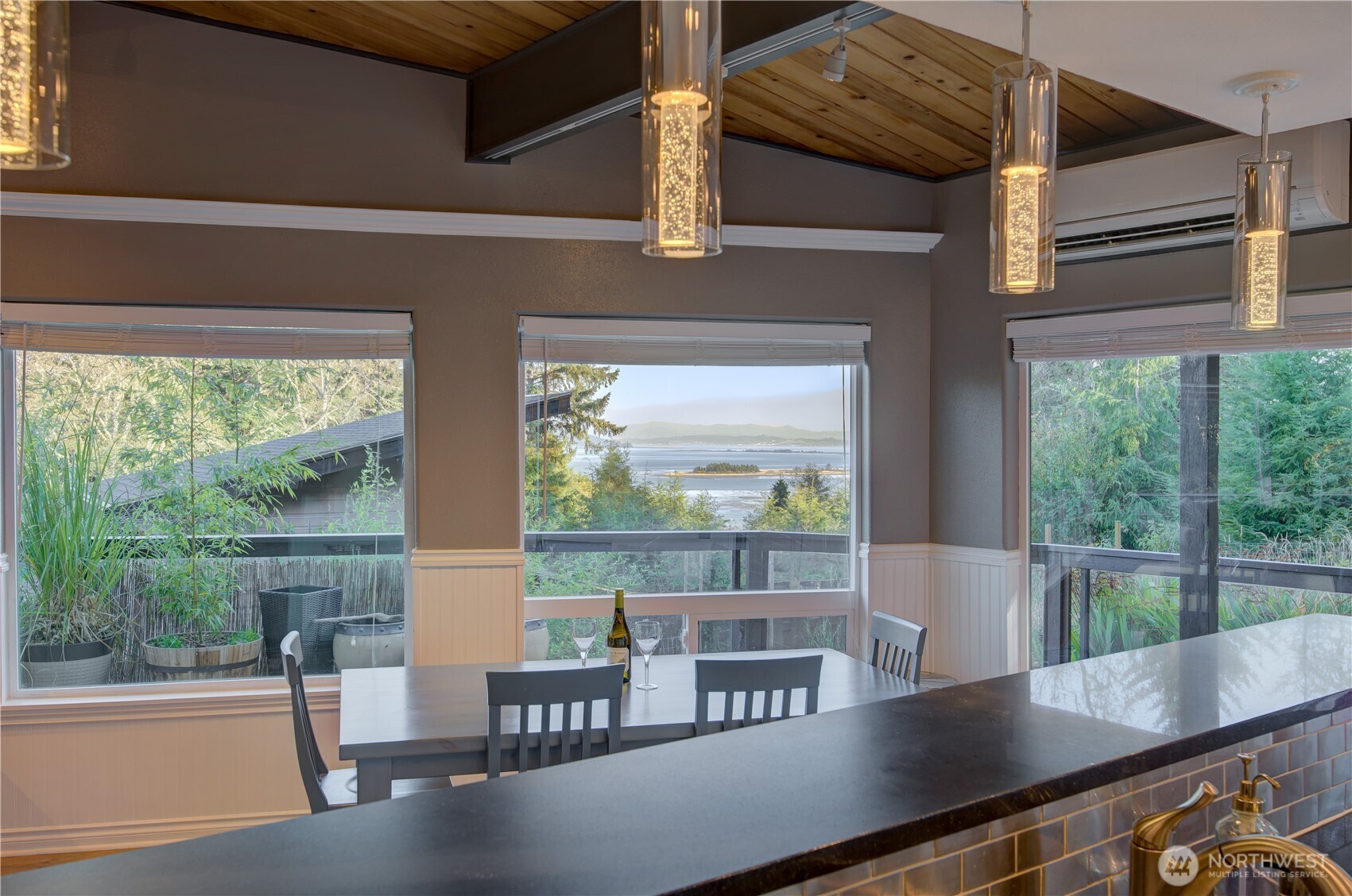 2144 Reservoir Road Ilwaco, WA 98624 - Photo 14 of 31 a view of a living room and floor to ceiling window