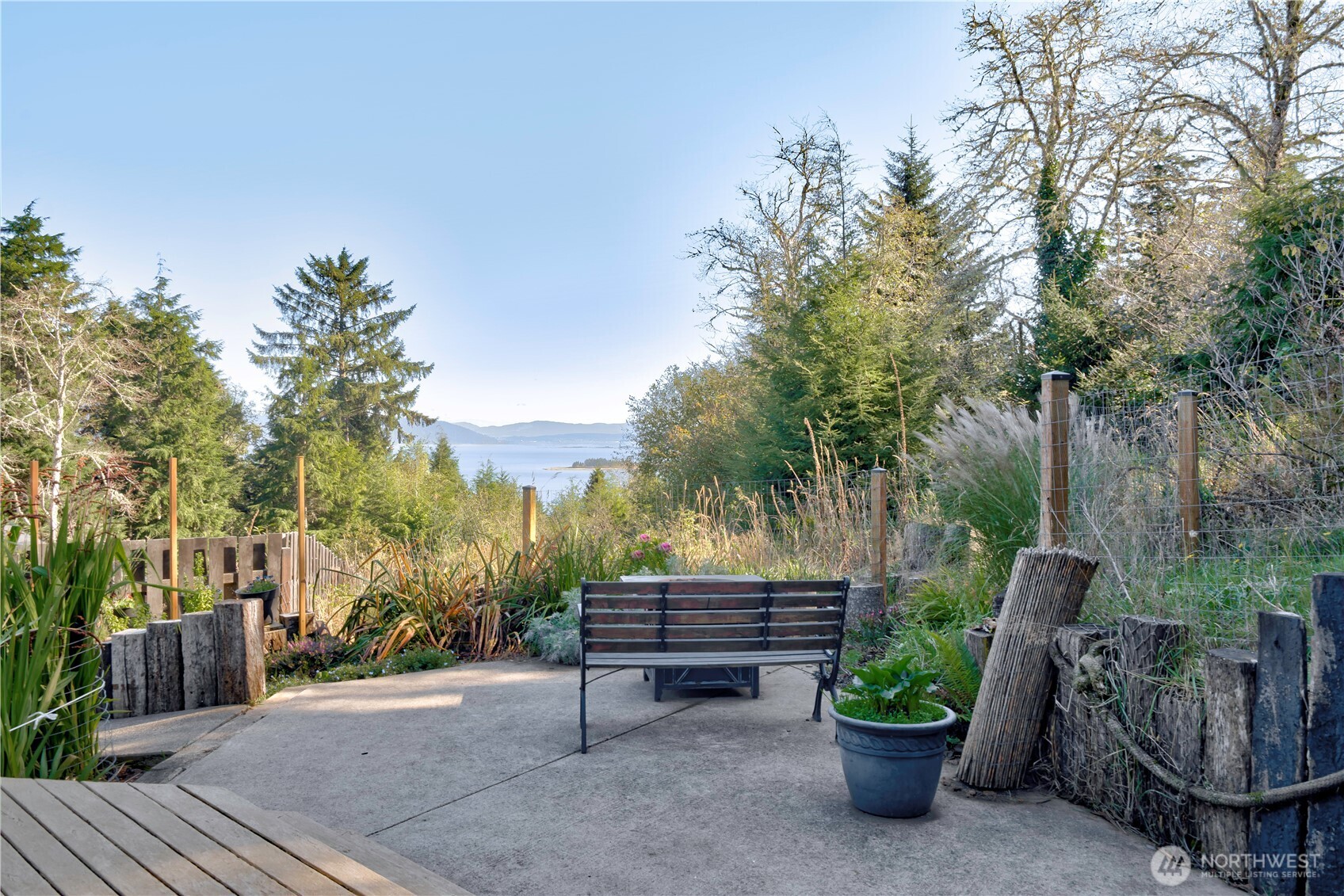 2144 Reservoir Road Ilwaco, WA 98624 - Photo 2 of 31 a view of a garden with furniture