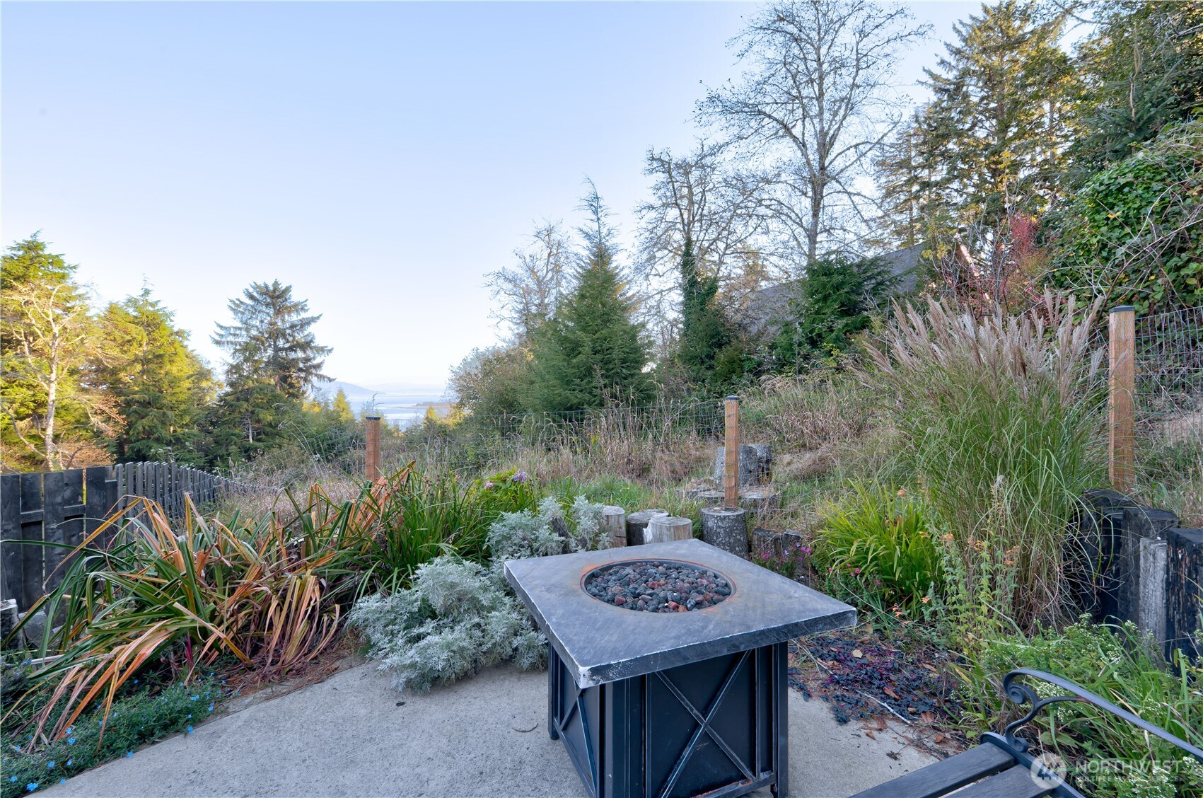 2144 Reservoir Road Ilwaco, WA 98624 - Photo 24 of 31 a view of a dinning table and chairs on roof deck