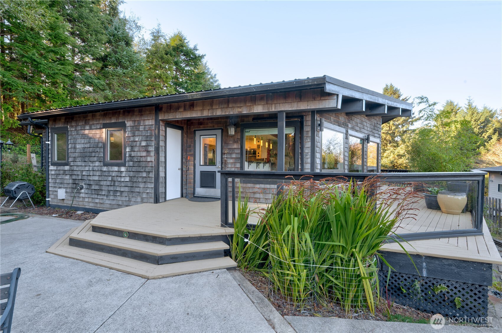 2144 Reservoir Road Ilwaco, WA 98624 - Photo 25 of 31 a front view of a house with garden