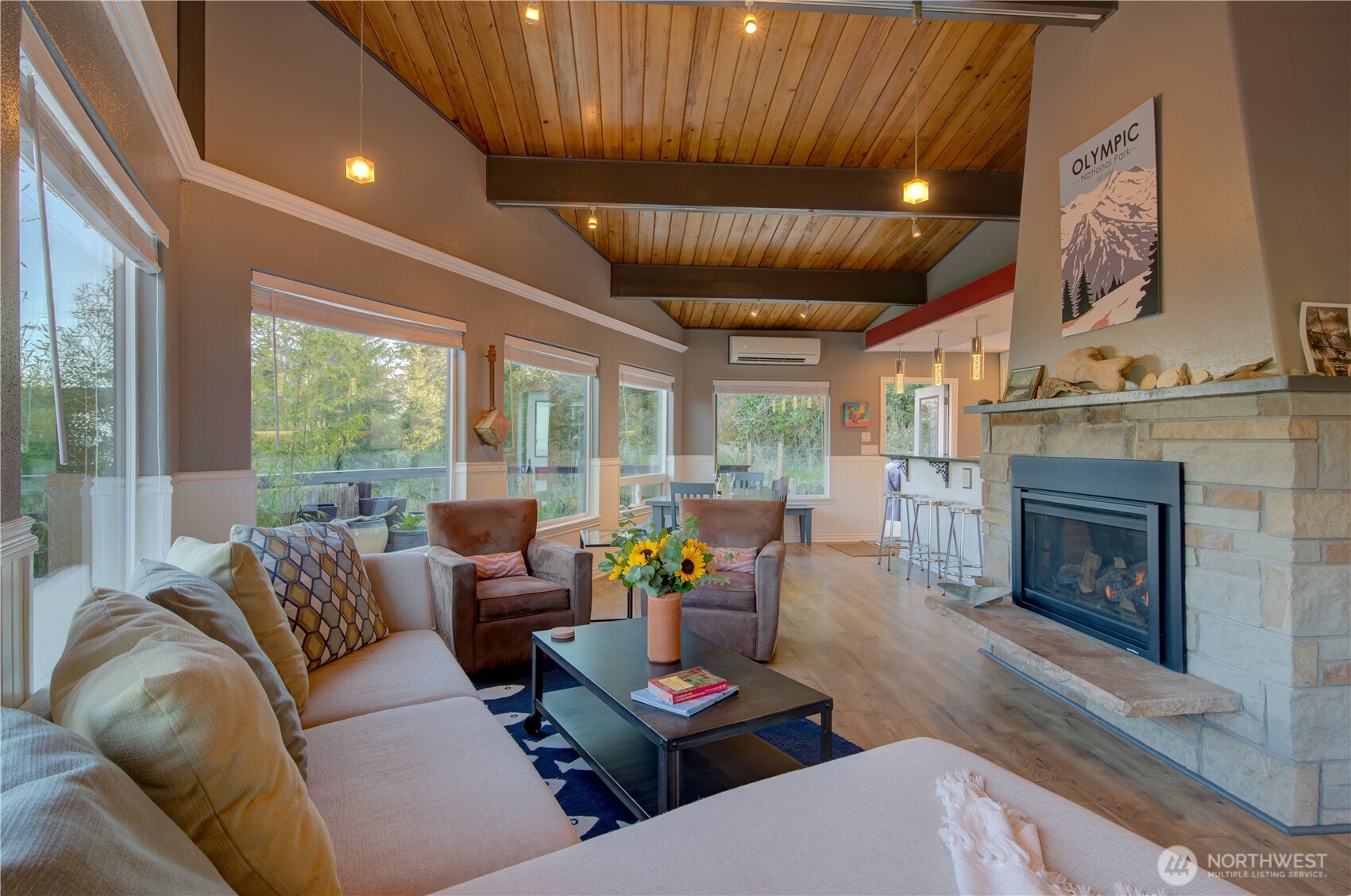 2144 Reservoir Road Ilwaco, WA 98624 - Photo 6 of 31 a living room with furniture and a fireplace