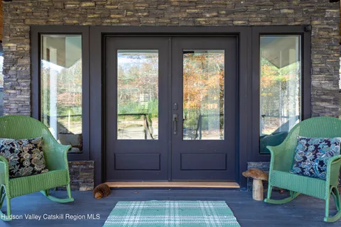 a kitchen with kitchen island a stove and a refrigerator