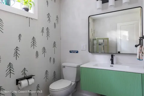 a bathroom with a sink and a shower