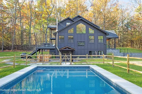 a view of a jacuzzi with a bench in a patio