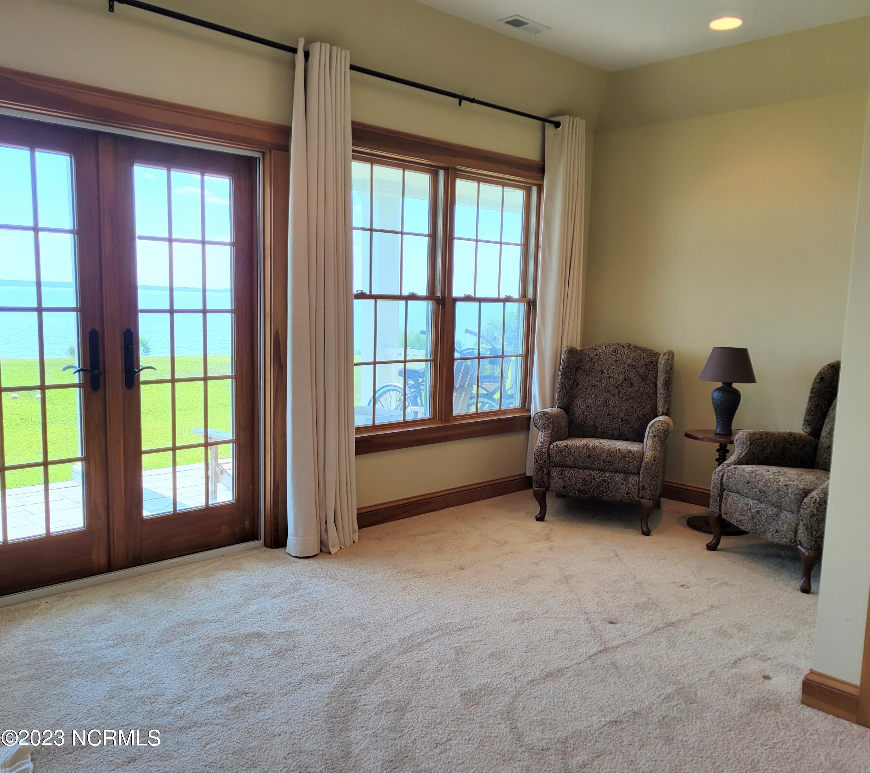 1129 Bennett Road, Unit 6A Minnesott Beach, NC 28510 - Photo 9 of 30 Primary Bedroom sitting area