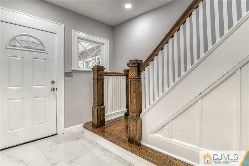 800 Old Raritan Road Edison, NJ 08820 - Photo 4 of 31 a view of entryway and hall with wooden floor