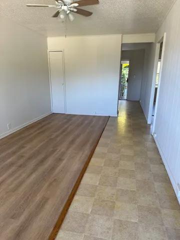 a view of a hallway with a chandelier