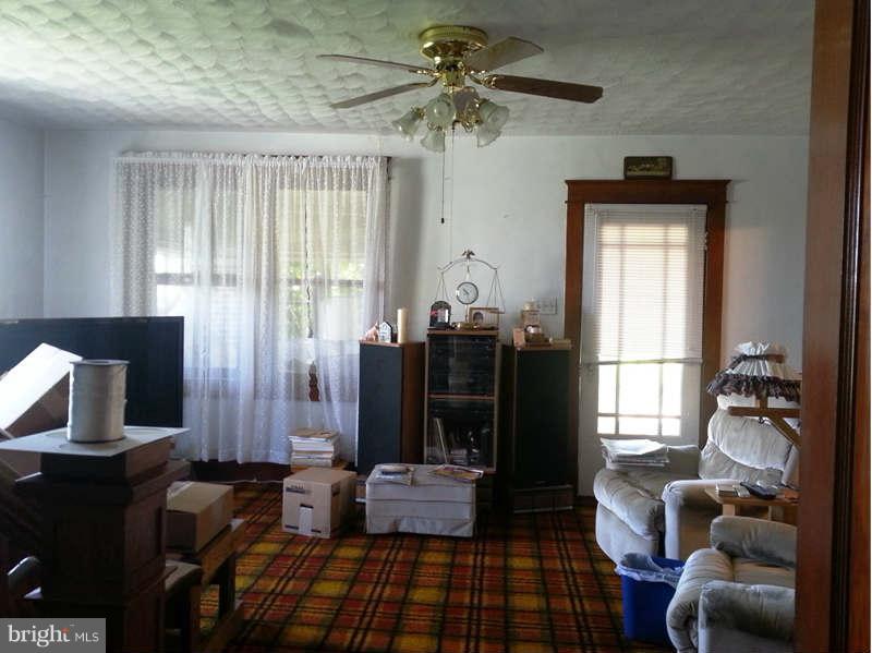 3355 Apple Pie Ridge Road Winchester, VA 22603 - Photo 12 of 29 a living room with furniture and a window