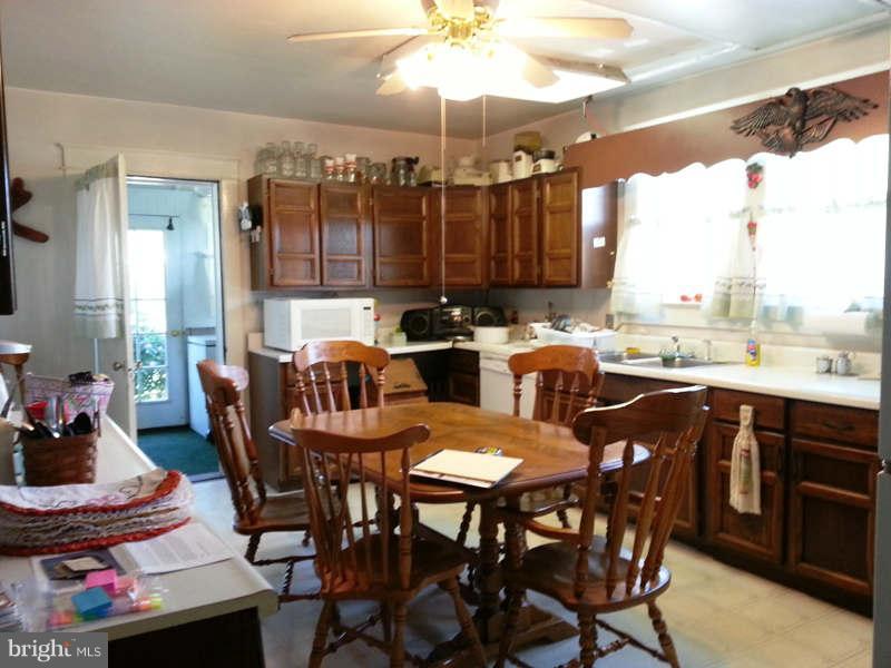 3355 Apple Pie Ridge Road Winchester, VA 22603 - Photo 5 of 29 a view of a dining room with furniture window and outside view