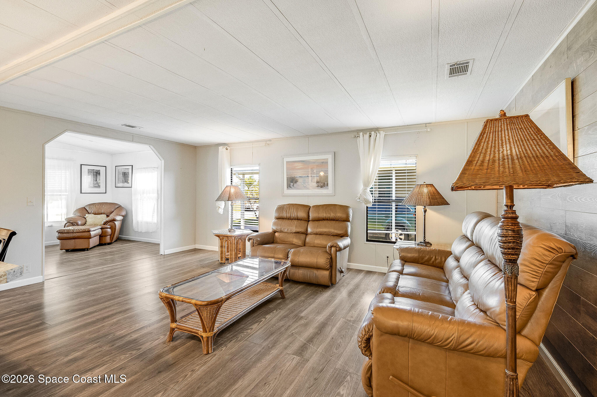 811 Silverthorn Court Barefoot Bay, FL 32976 - Photo 21 of 74 a living room with furniture