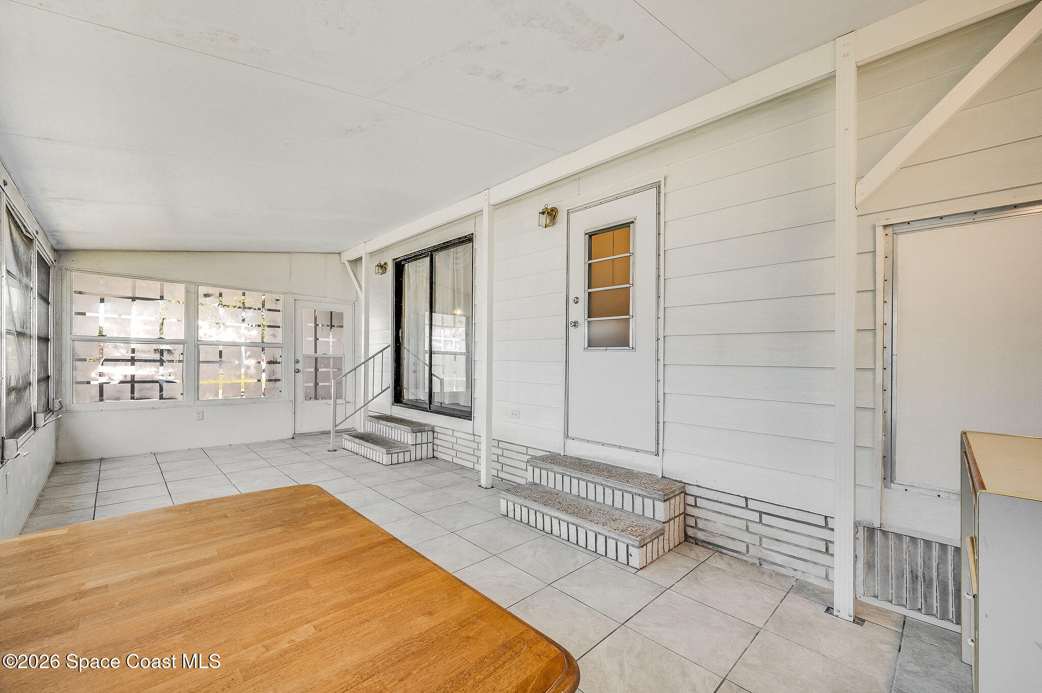 811 Silverthorn Court Barefoot Bay, FL 32976 - Photo 42 of 74 Sun room