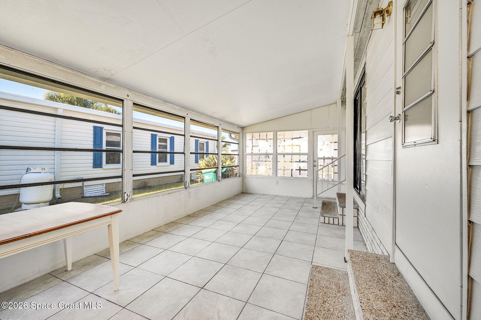 811 Silverthorn Court Barefoot Bay, FL 32976 - Photo 43 of 74 Sun room