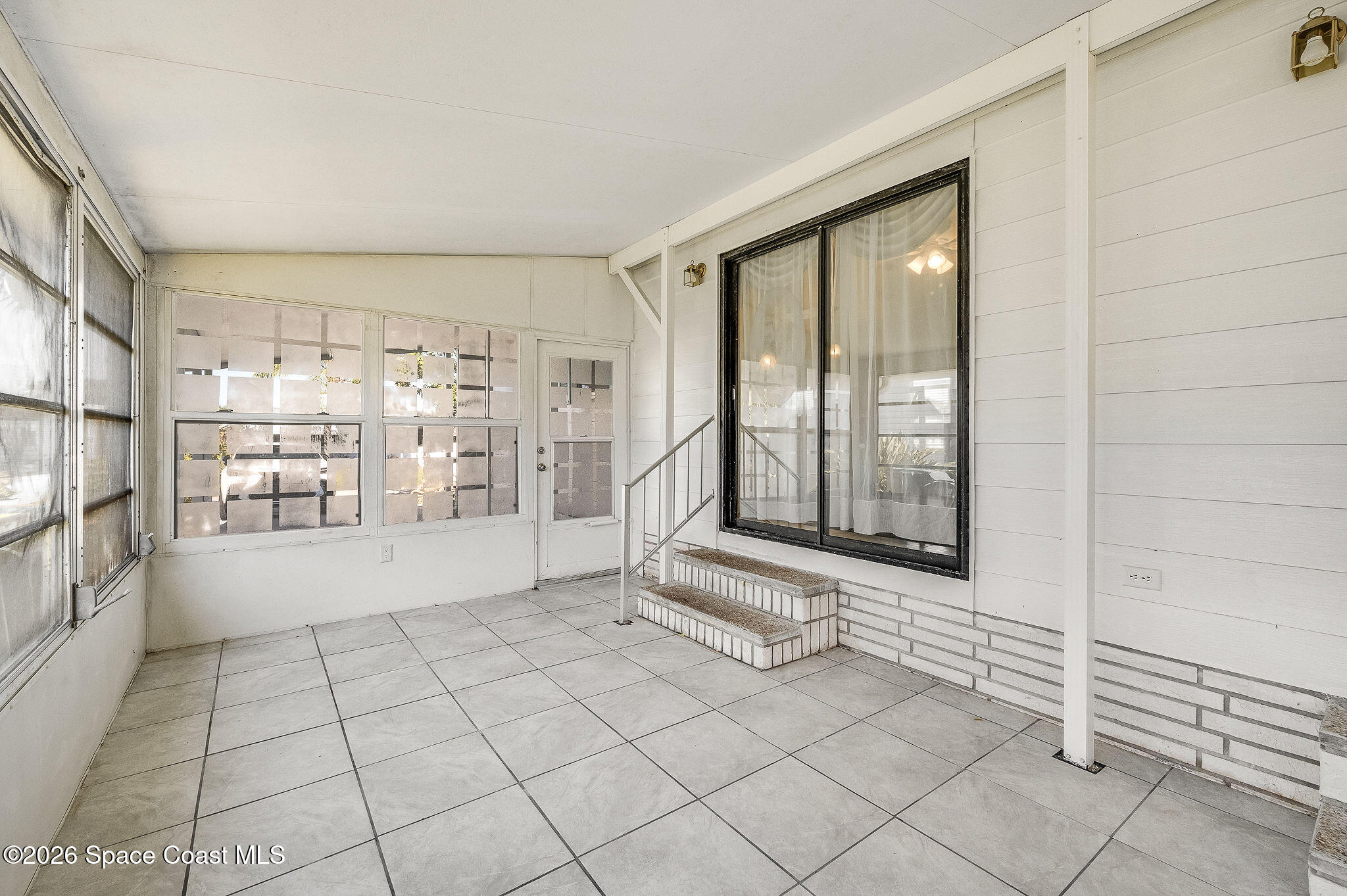 811 Silverthorn Court Barefoot Bay, FL 32976 - Photo 44 of 74 Sun room