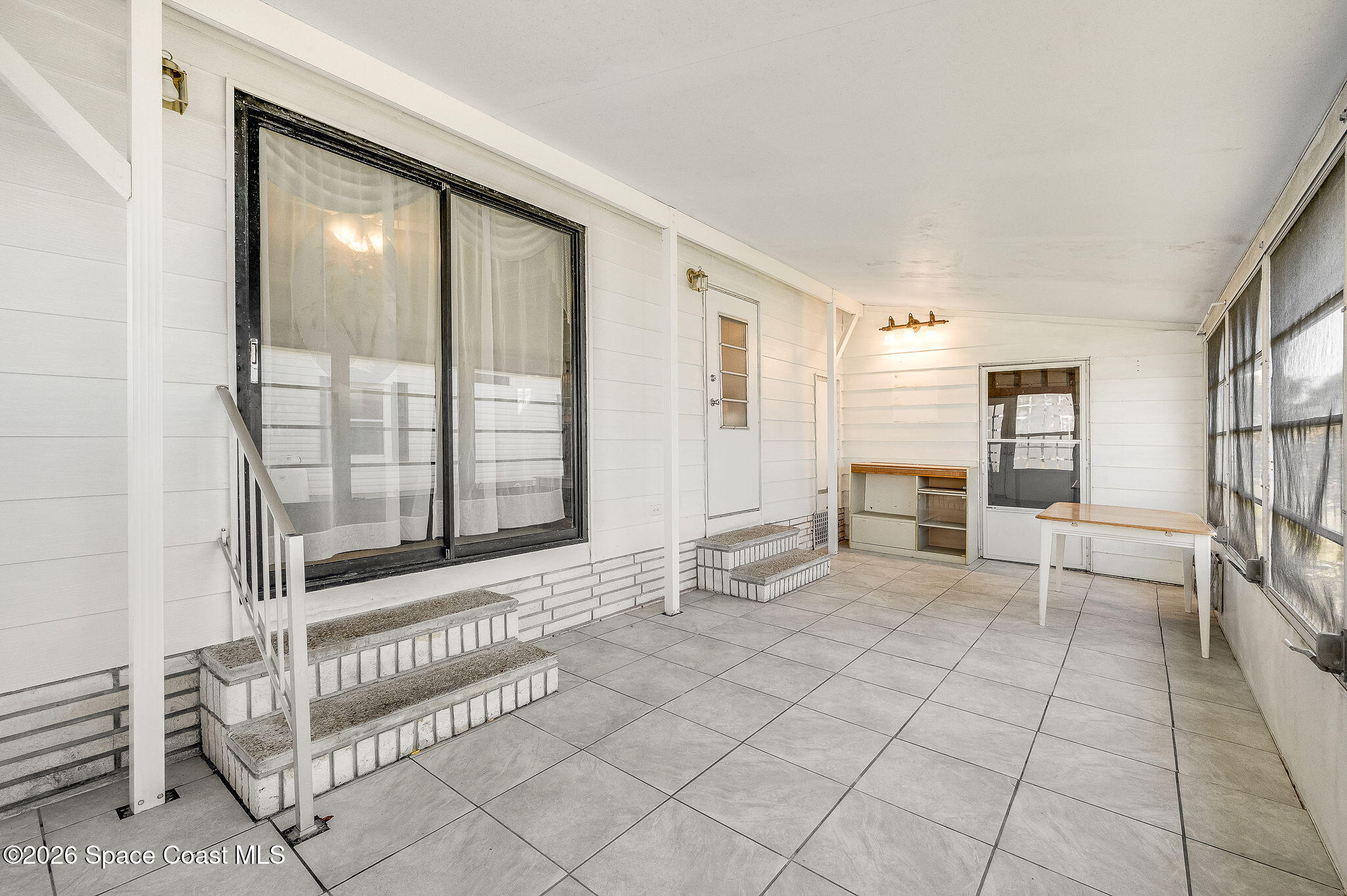 811 Silverthorn Court Barefoot Bay, FL 32976 - Photo 45 of 74 Sun room