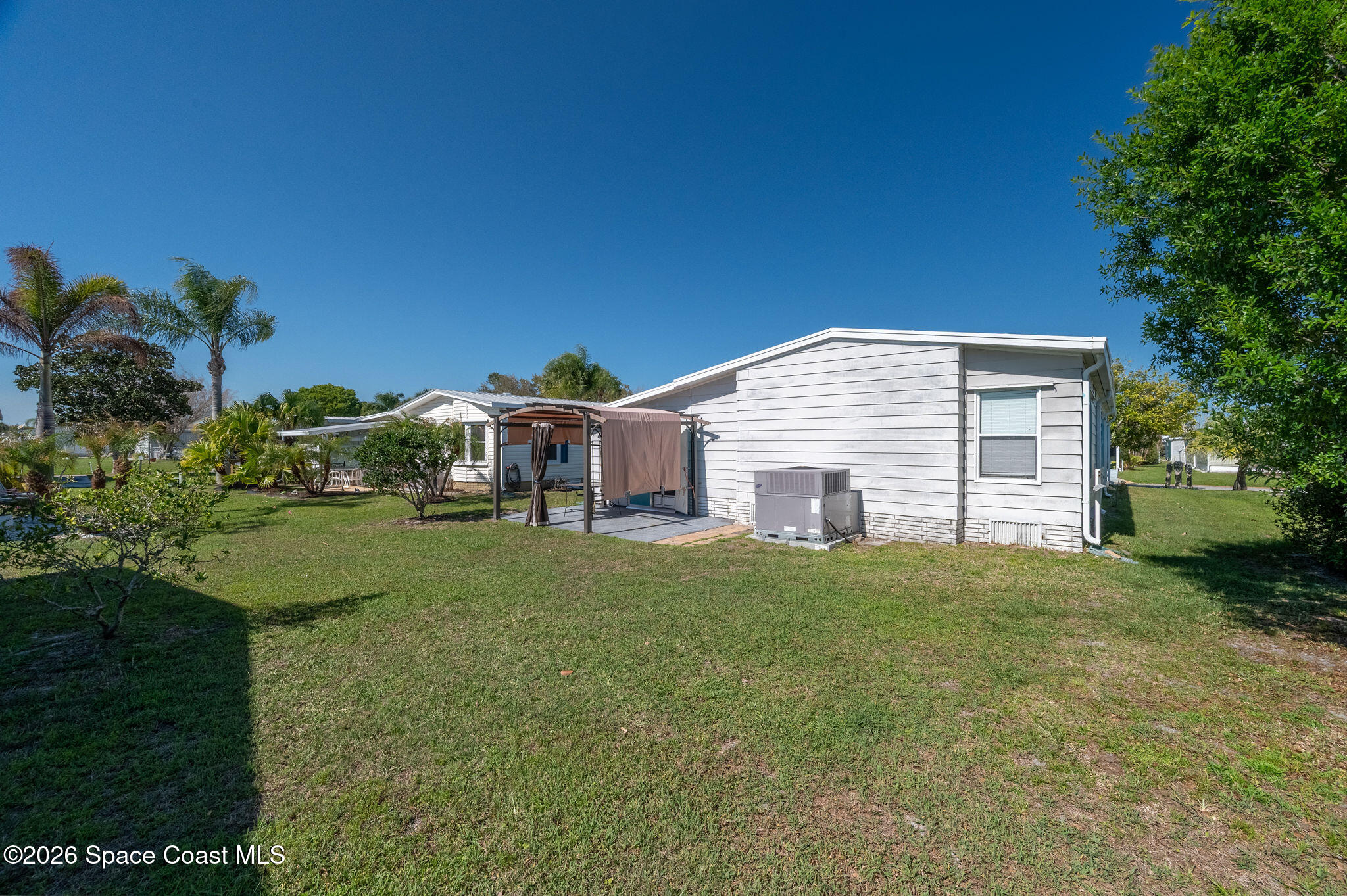 811 Silverthorn Court Barefoot Bay, FL 32976 - Photo 52 of 74 Rear