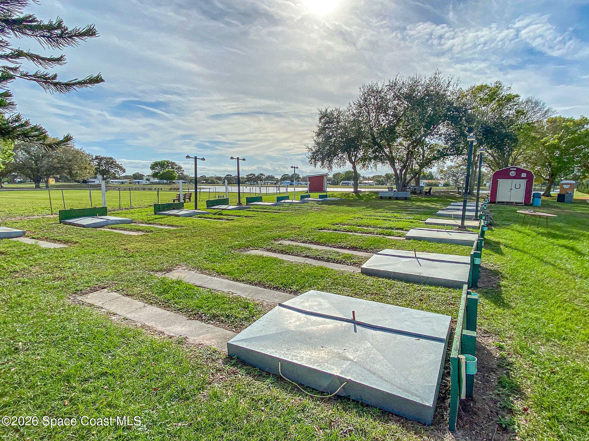 811 Silverthorn Court Barefoot Bay, FL 32976 - Photo 63 of 74 a view of a park with large trees