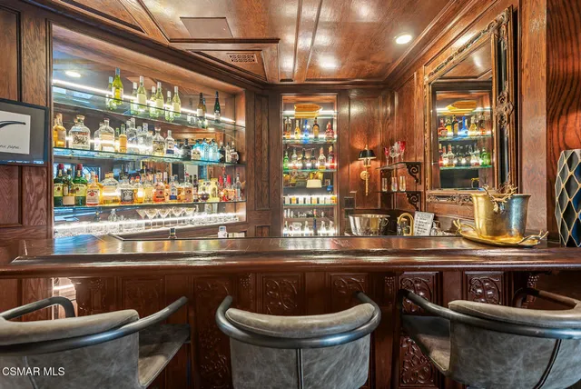 a kitchen with a sink and a stove