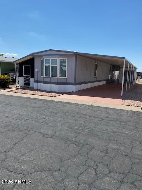 301 South Signal Butte Road, Unit 514 Apache Junction, AZ 85120 - Photo 2 of 31 301 S. Signal Butte #514 Pic 2 Front Car