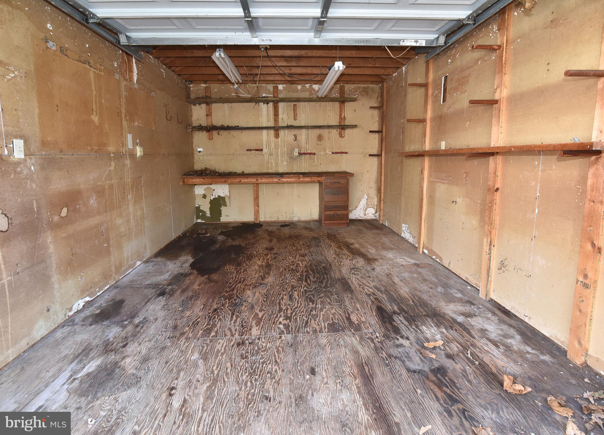 108 Roselawn Road Annapolis, MD 21403 - Photo 40 of 43 Garage Shed with roll up door and plenty of room