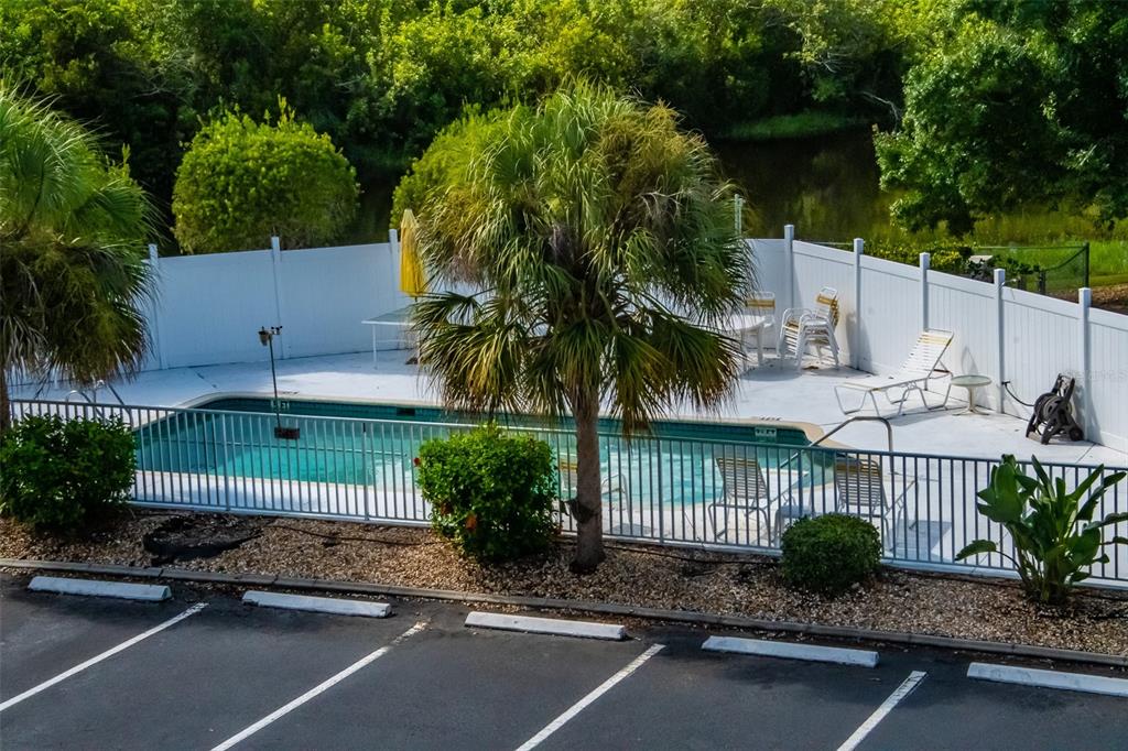 175 Kings Highway, Unit 933 Punta Gorda, FL 33983 - Photo 30 of 32 a front view of a house with a garden