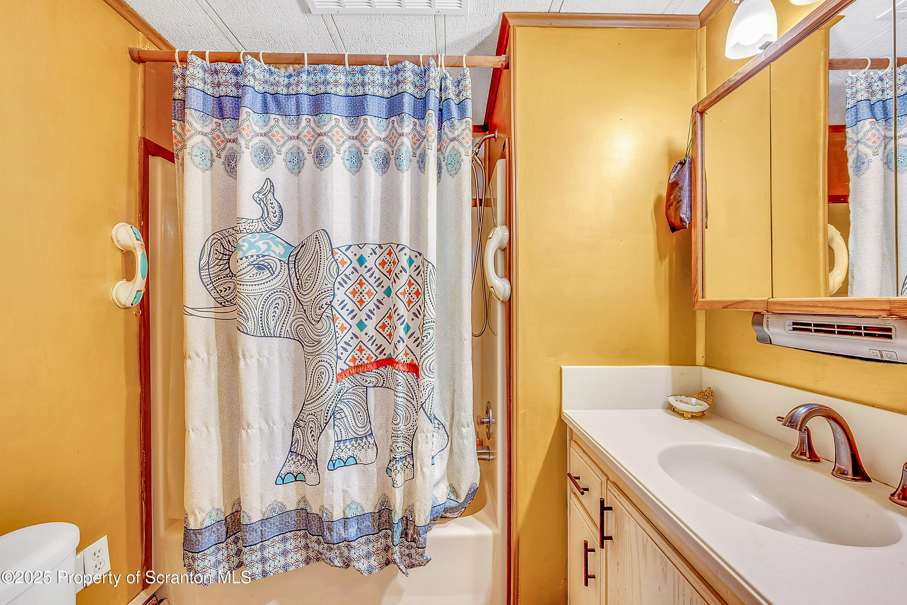 10 Bald Mt Road Clarks Summit, PA 18411 - Photo 37 of 42 a bathroom with a sink and a mirror