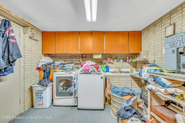 a view of storage and utility room