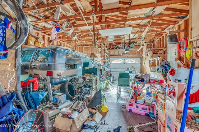 a room with furniture and large windows